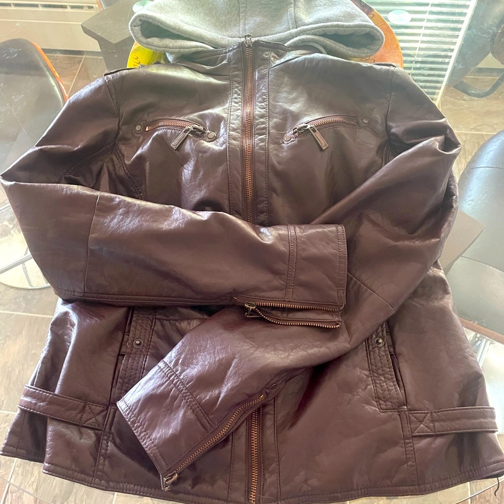 Comfortable vegan leather and fur hooded jacket.